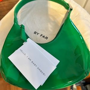 Green baby amber purse never worn